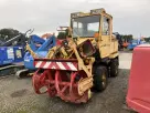 SNOW REMOVING MACHINE